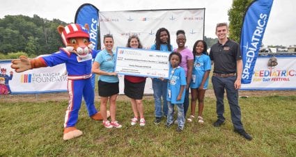 Presenting $25,000 Check to Ronald McDonald House Charities