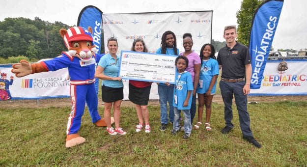 Presenting $25,000 Check to Ronald McDonald House Charities