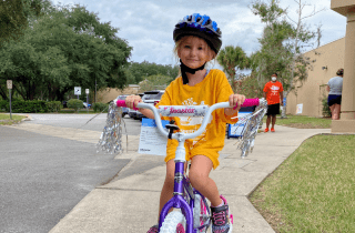 Child on brand new bike